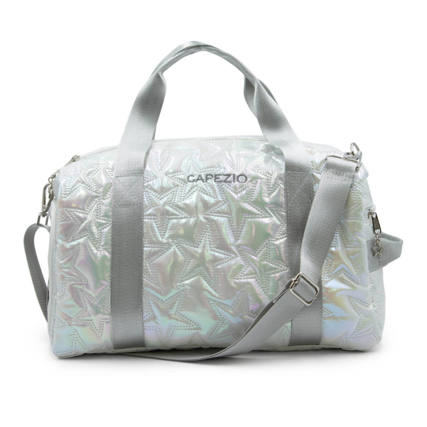 Iridescent metallic star design travel duffle bag with tote shoulder straps, an adjustable and detachable shoulder strap, and a Capezio logo on the side.