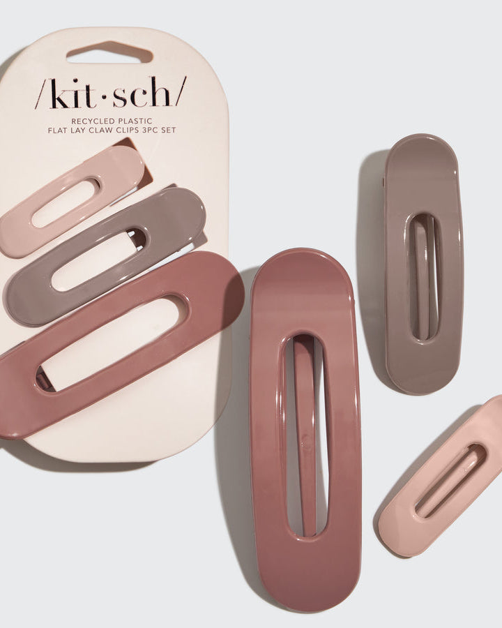 Set of three hair clips in pink and brown neutral hues with 'kit-sch' packaging.