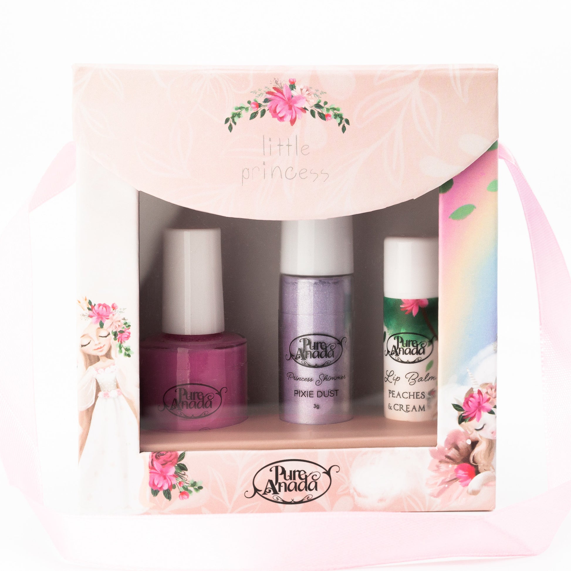 Set of three Pure Anada products in a decorative box with floral designs. One nail polish, one purple roll on glitter, and one lip balm in a peaches & cream flavour.